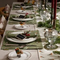 Robin Fabric Placemat -Sophie Allport Shop all101820 all101300 all104810 robin fabric placement napkins table runner Christmas dinner table landscape lifestyle high res square 74ab4793 2d58 48e7 9673 081d674879d6