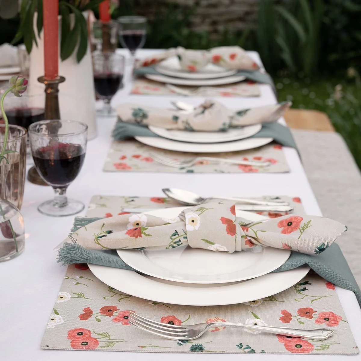 Poppy Meadow Fabric Placemats (Set of 2) Poppy Meadow Fabric Placemats (Set Of 2) -Sophie Allport Shop all103820 poppy meadow placement napkin outdoor 2 lifestyle high res square d4516a7b 428e 4ff5 8bff e7b6277a06d5