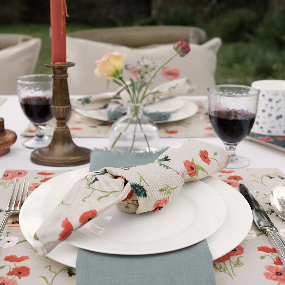 Poppy Meadow Fabric Placemats (Set of 2) Poppy Meadow Fabric Placemats (Set Of 2) -Sophie Allport Shop all103820 poppy meadow placement napkin outdoor lifestyle high res square