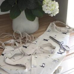 Purrfect Adult Apron -Sophie Allport Shop all31250 purrfect cat adult apron lifestyle high res square 9c1c6539 0c3e 4a7e 888e 73523521089d