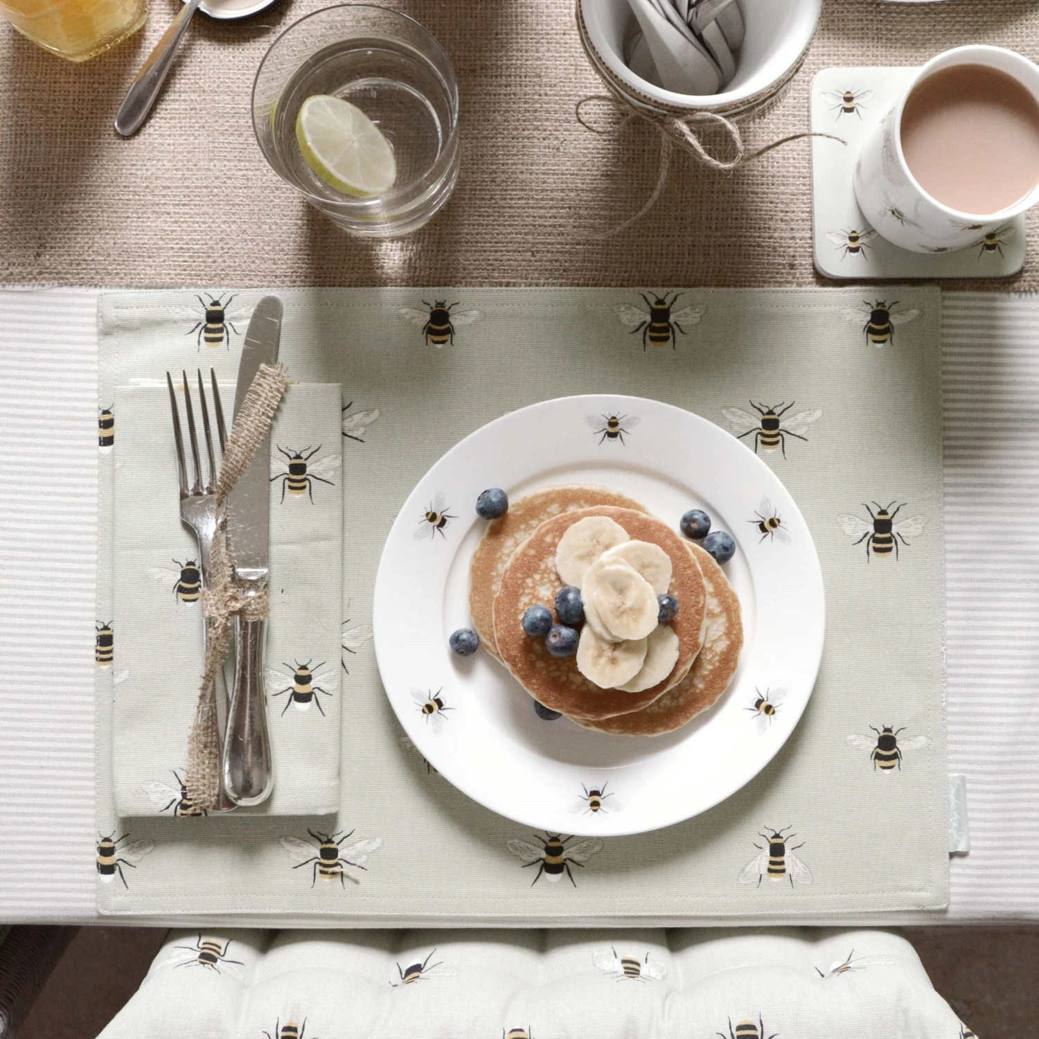 Bees Fabric Placemat Bees Fabric Placemat -Sophie Allport Shop all36820 bees fabric placemat lifestyle high res pancake square b1841c76 59c0 48ef a5f1 866ed7923a6a scaled