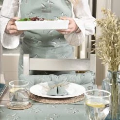 Coastal Birds Fabric Placemats (Set Of 2) -Sophie Allport Shop all65250 all65810 coastal birds adult apron and table runner lifestyle high res square cc80eebd 133d 4632 bf00 1769d5764621