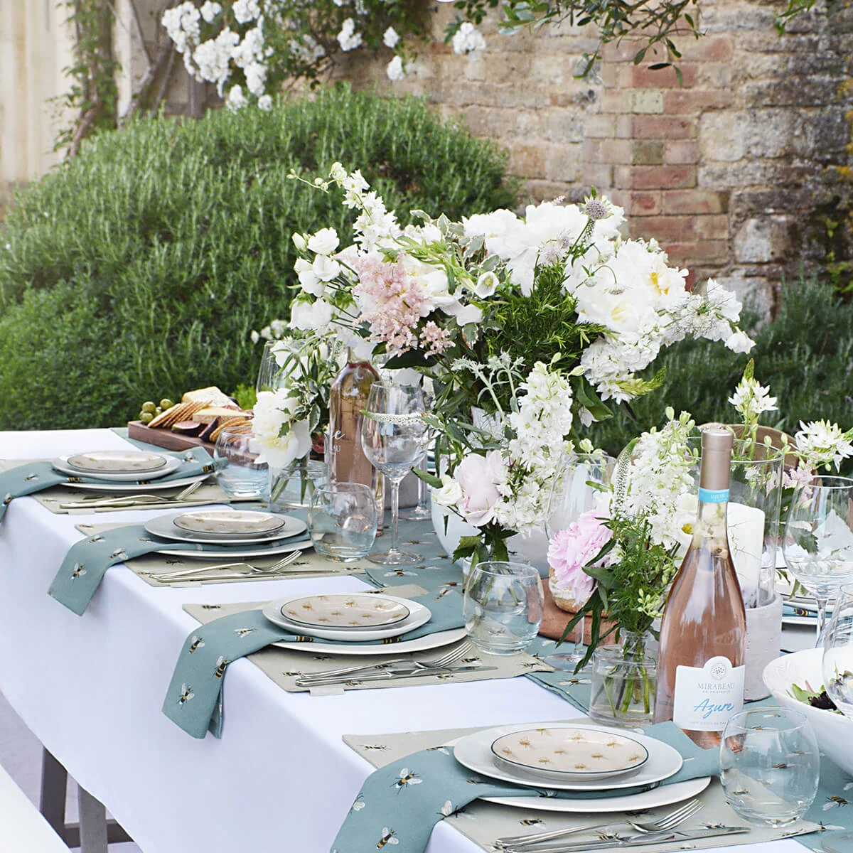 Bees Fabric Placemat Bees Fabric Placemat -Sophie Allport Shop bees table setting outdoors 2 lifestyle high res square