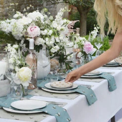 Bees Teal Napkins (Set Of 4) 3 Bees Teal Napkins (Set Of 4) -Sophie Allport Shop bees table setting outdoors 3 lifestyle high res square