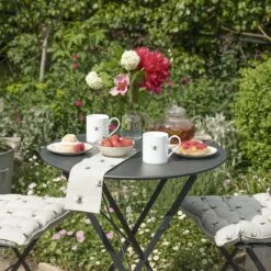 Bees Chair Pad -Sophie Allport Shop bm3603 all36601 all36450 bees solo standard mugs tea towel and chair pads lifestyle high res square ad3f1a39 2d7d 4104 b190 c945c66d7e9e