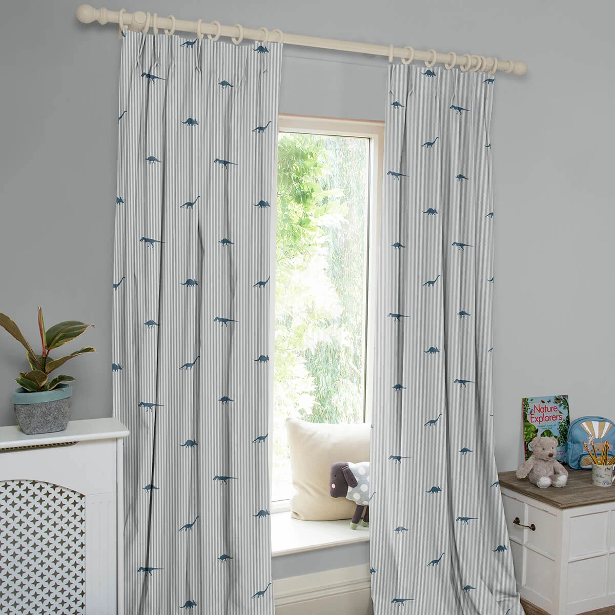 Dinosaurs Navy Made to Measure Curtains Dinosaurs Navy Made To Measure Curtains -Sophie Allport Shop crt45nm2m dinosaur navy made to measure curtains lifestyle high res square