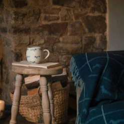 Dachshund Wool Knitted Throw -Sophie Allport Shop ktw46 spm72 dachshund knitted throw wool and fetch mug stoneware lifestyle high res square