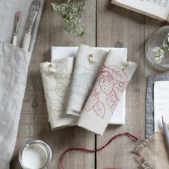 Strawberries Pink Red Linen Blend Fabric By The Metre -Sophie Allport Shop lin97000 lin97000d lin97000s strawberries fabric linen blend collection flat lay portriat lifestyle high res square