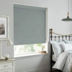 Boxing Hares Deep Duck Egg Made To Measure Roller Blind -Sophie Allport Shop rlb25ddm2m hare deep duckegg vector roller blind made to measure lifestyle 2 high res square