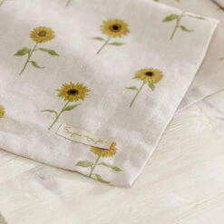 Sunflower Linen Table Runner 2 Sunflower Linen Table Runner -Sophie Allport Shop ss23 sunflower lin108810 tablerunner detail1 square